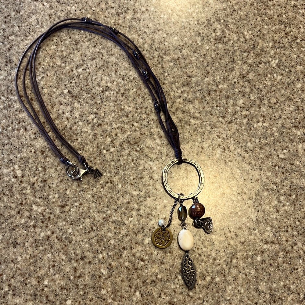 Silpada leather necklace with assorted charms